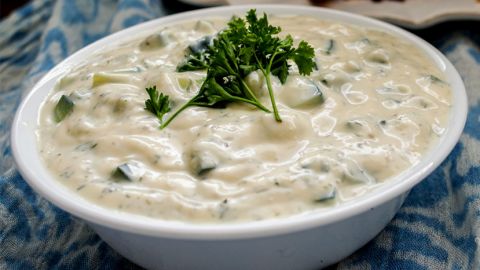 It's served on the side with warm pita bread triangles for dipping, and is also used as a condiment for souvlaki